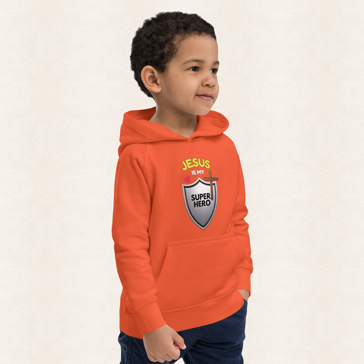 Jesus Is My Superhero Kids Hoodie — original product and design — warm ivory background