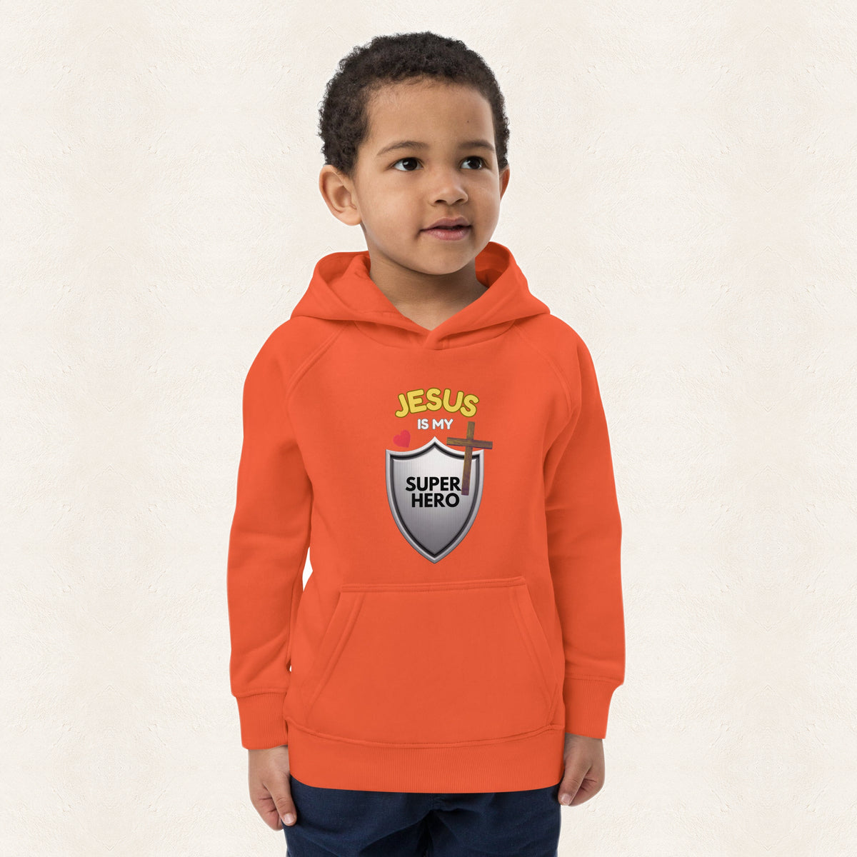 Jesus Is My Superhero Kids Hoodie — original product and design — warm ivory background