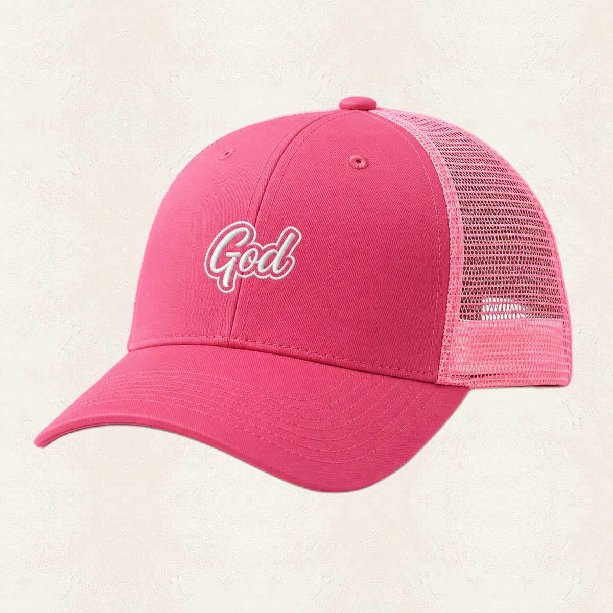 God Embroidered Trucker Hat — original product and design — warm ivory background