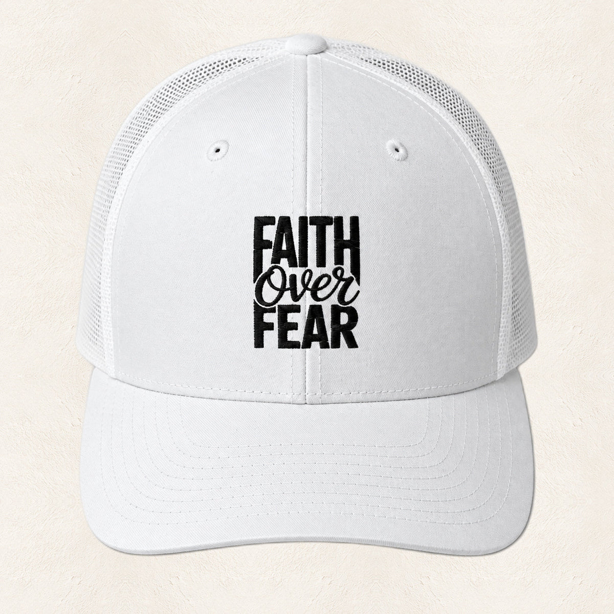 Faith Over Fear Embroidered Trucker Hat — original product and design — warm ivory background