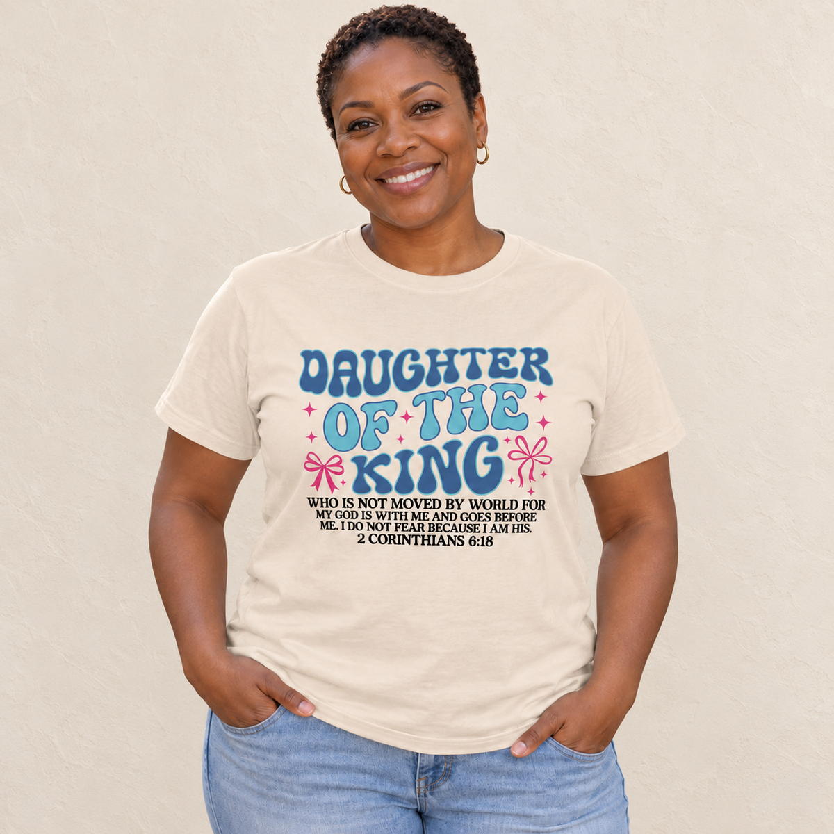 Daughter of the King Bible Verse Women's T-Shirt — original model and design, warm ivory background
