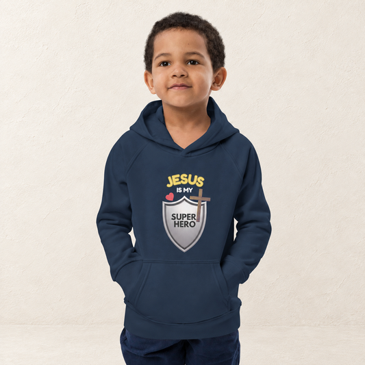Jesus Is My Superhero Kids Hoodie — original child model — warm ivory textured background